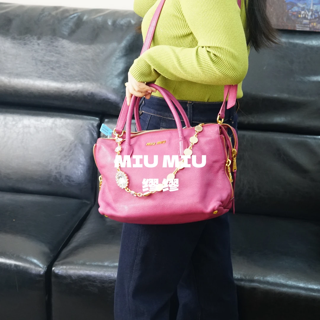 95新 MIU MIU/缪缪 粉色斜挎包/WJ12626039/6039
