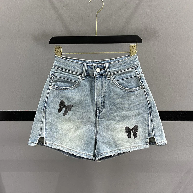 300斤特大码美式蝴蝶结刺绣牛仔短裤女胖mm高腰显瘦设计感a字热裤