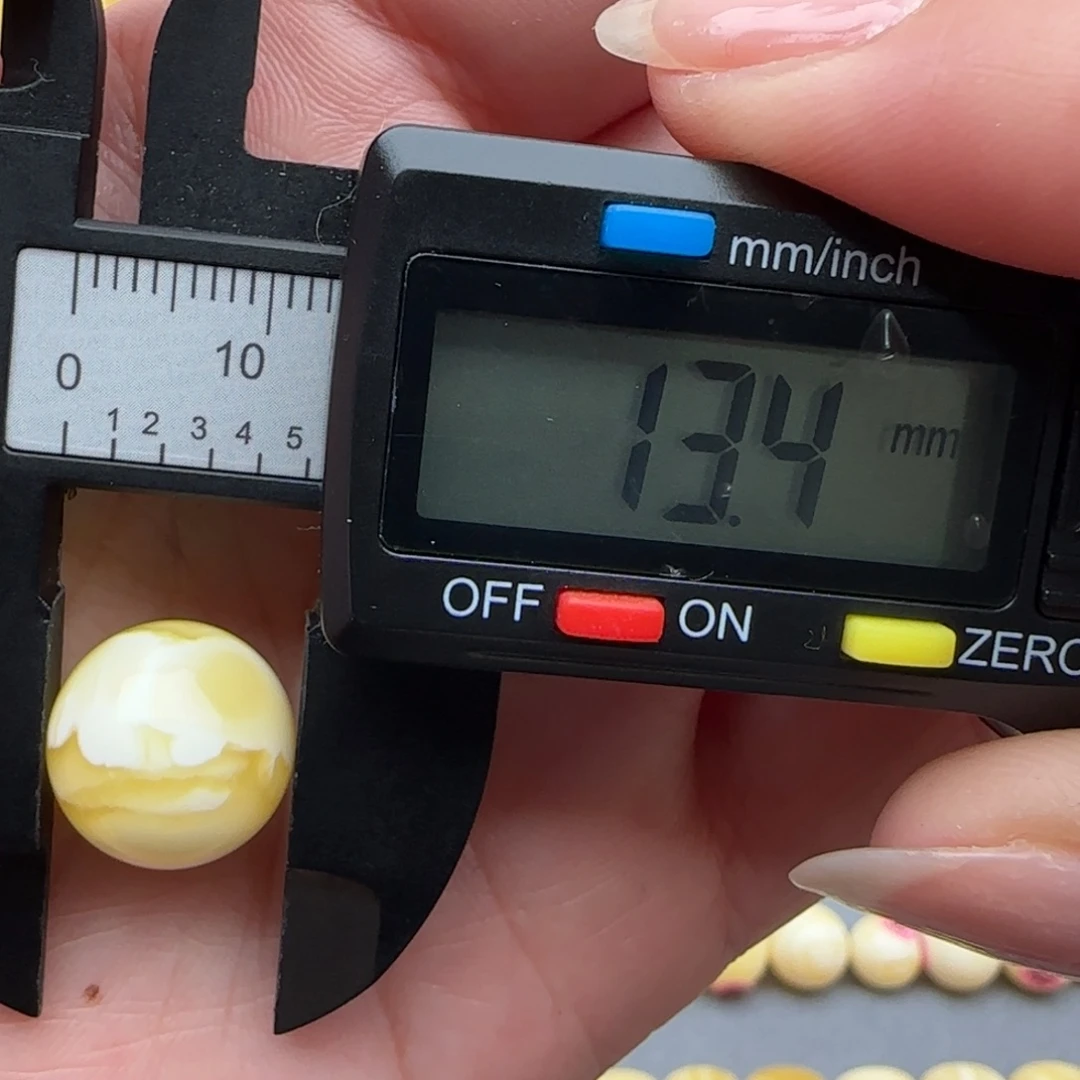 蜜蜡未镶嵌裸石瓷白妖花珠子