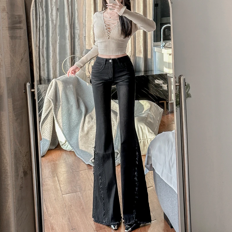 黑色2025年春季新款高腰毛边微喇叭牛仔裤女显瘦设计感修身马蹄裤