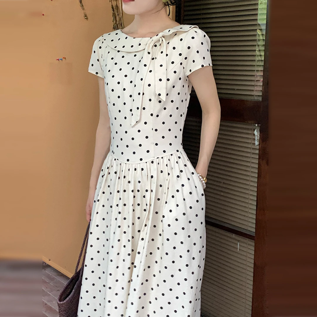 法式气质白色波点连衣裙子女夏季2025新款爆款绝美巨好看收腰长裙