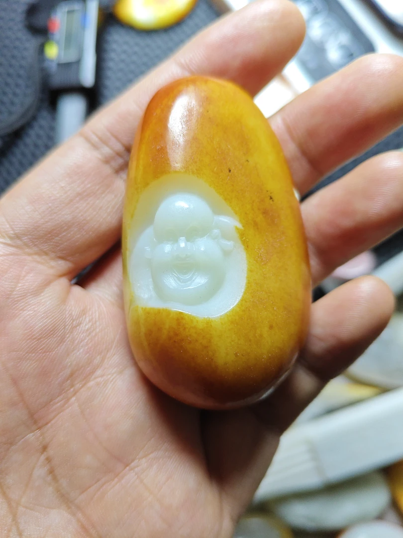 和田玉精品手把弥勒佛