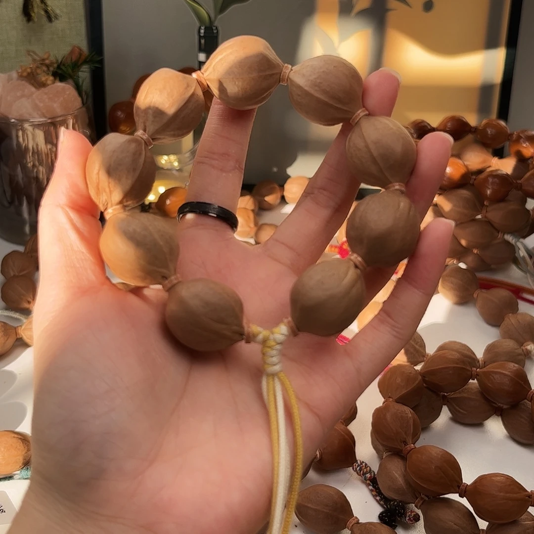 咖***泡橄榄核吊坠2126素串