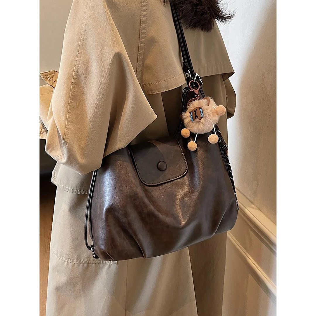 多功能大容量包包女2025春夏新款单肩包复古斜挎包通勤双肩云朵包