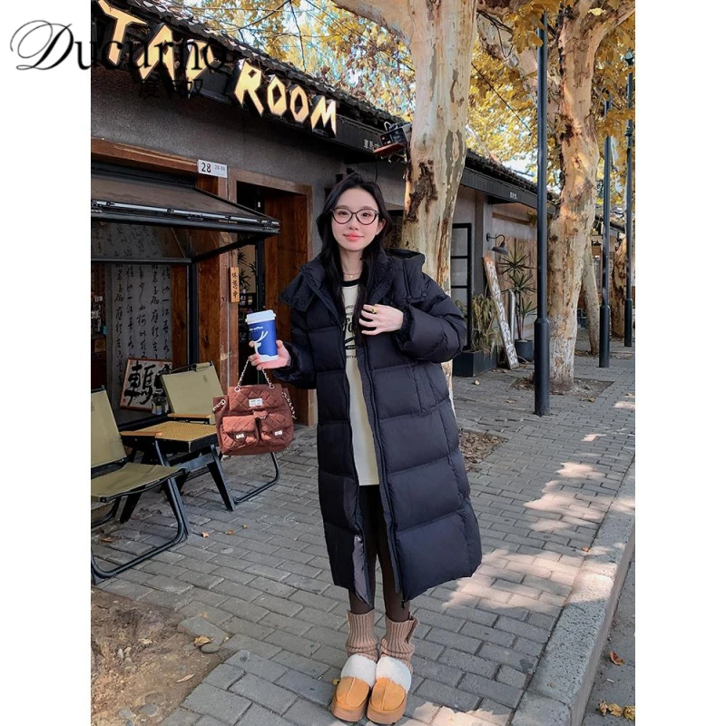 宽松黑色羽绒服女2025冬季新款长款过膝加厚面包服白鸭绒保暖外套