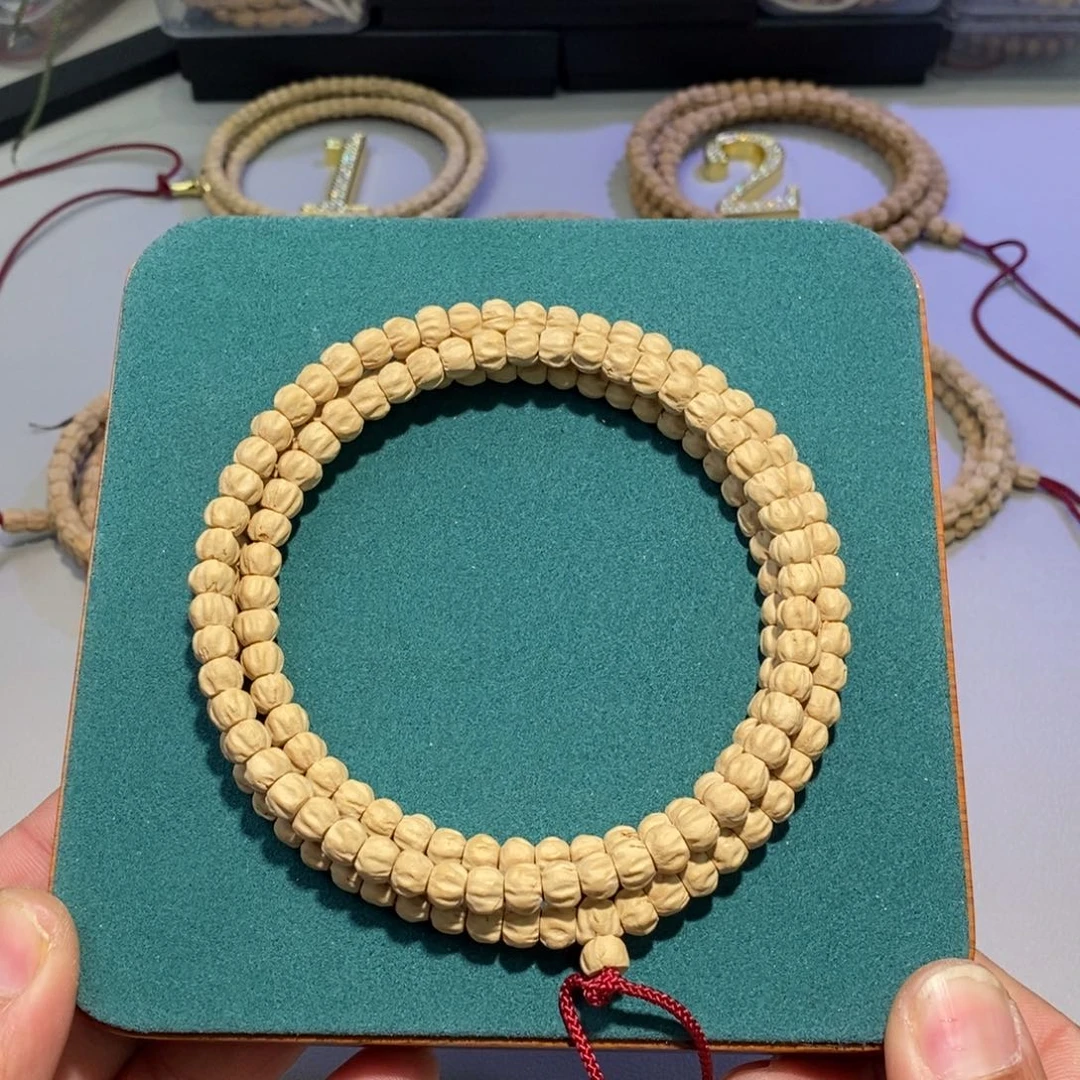 柏香籽/百香籽吊坠吃****?莲花