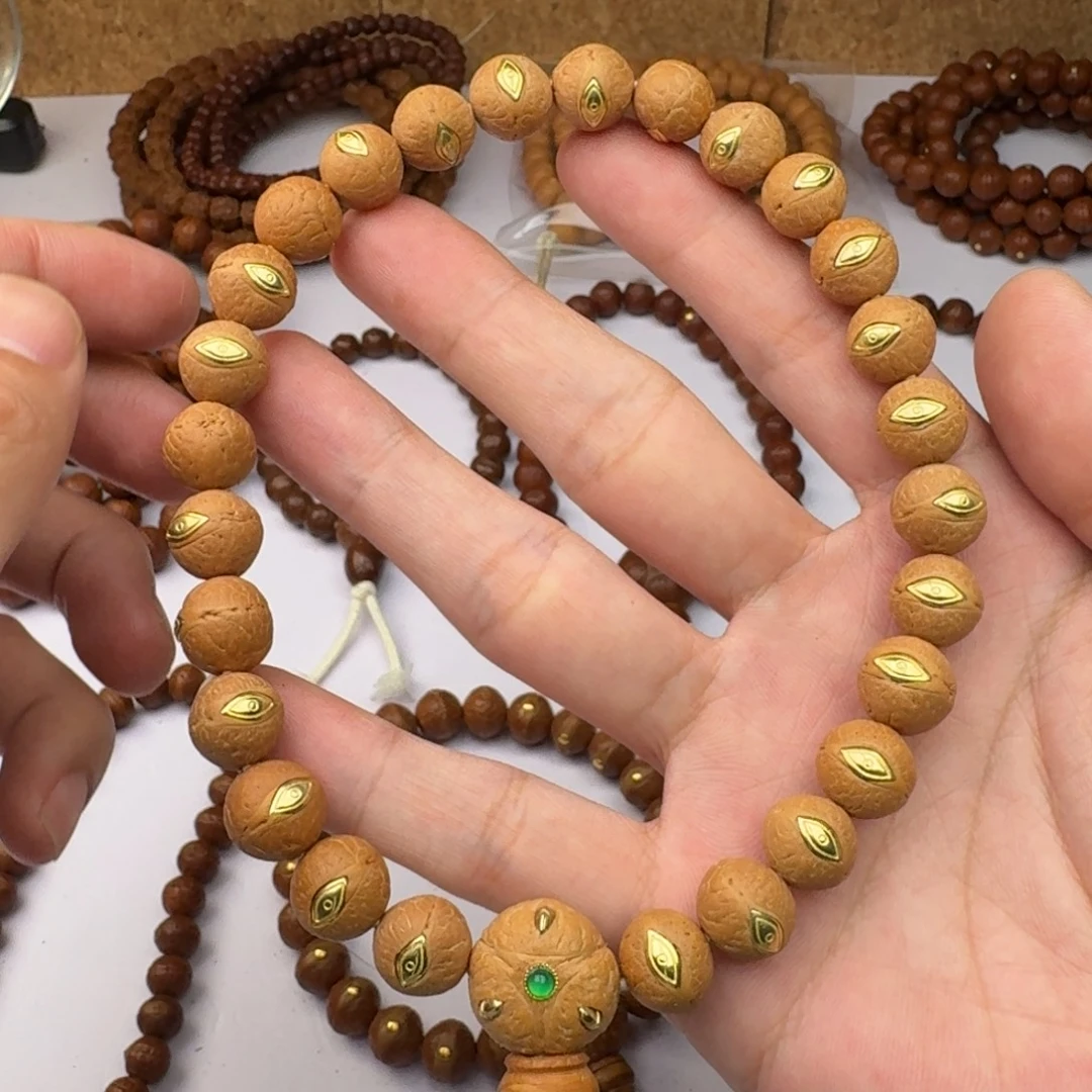 不***阳凤眼菩提手串11.5铜钉慈悲眼