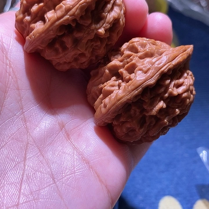一***醒吊坠文玩核桃吗疑问