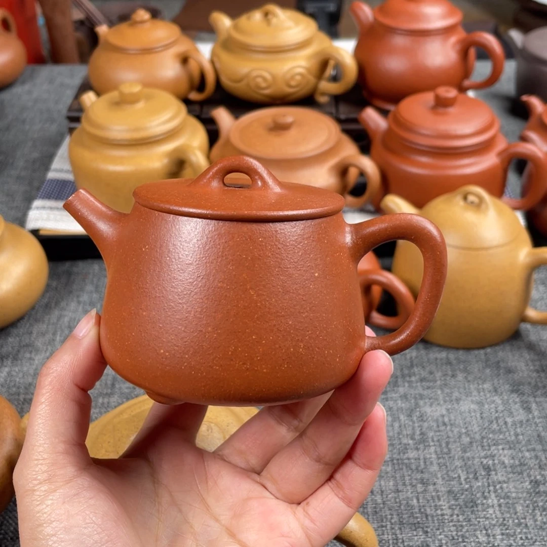 紫砂茶壶余***行40目红降坡180高石瓢全手