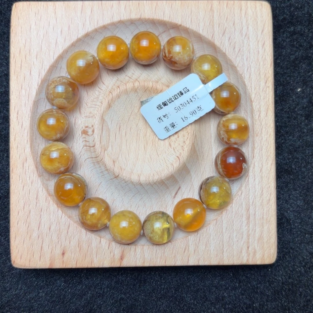 琥珀未镶嵌珠宝奇石12mm金底蛋黄溶洞
