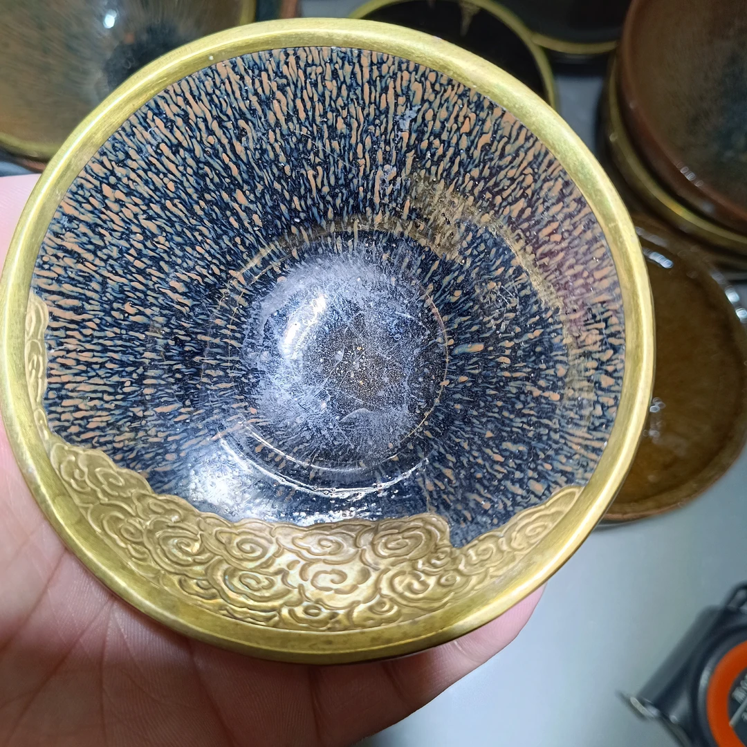 ​水吉窑宋建盏，磨口包铜口，缺处錾祥云，口径9.5高5厘米