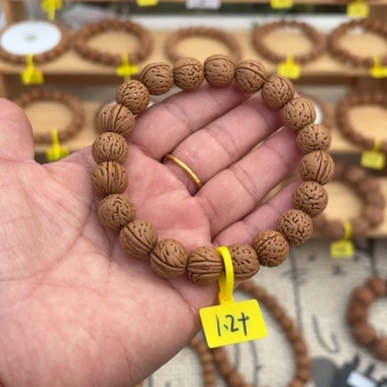 木质野生桃核手串