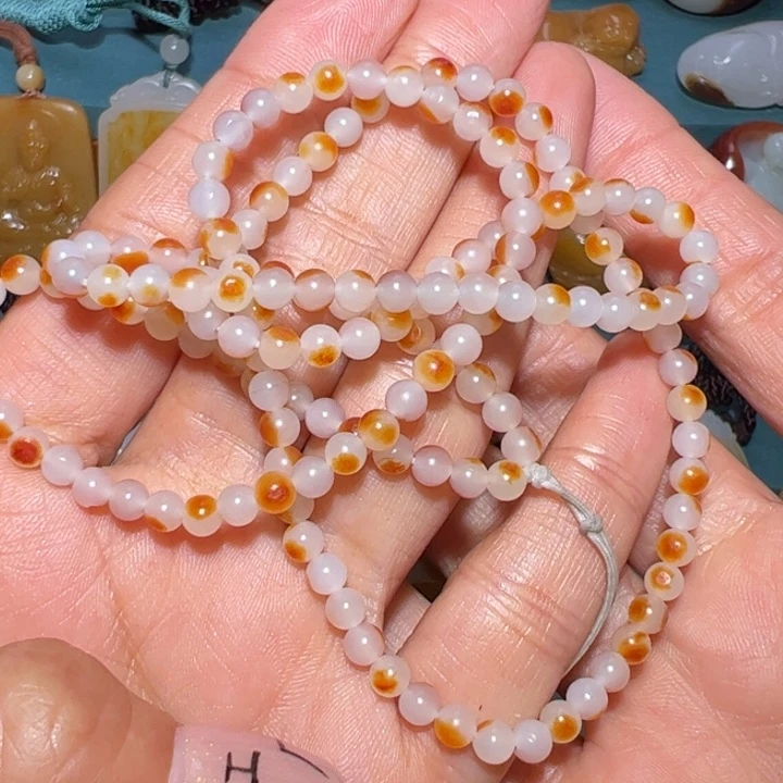 明***启和田玉未镶嵌颈饰