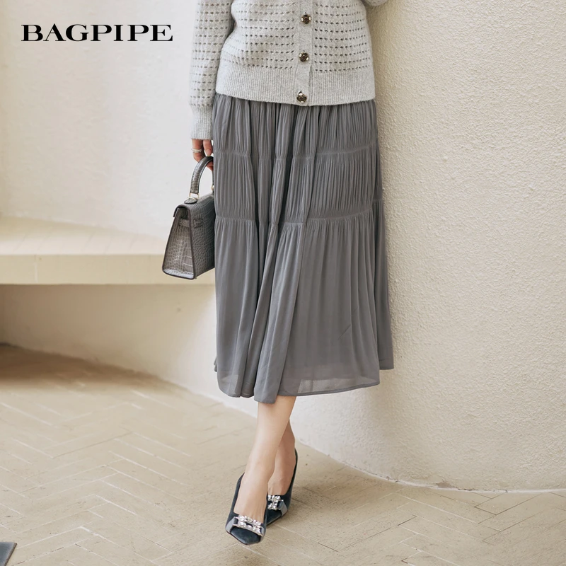 风笛2025秋季新款复古简约温柔风垂感纯色松紧腰长裙蛋糕裙半身裙