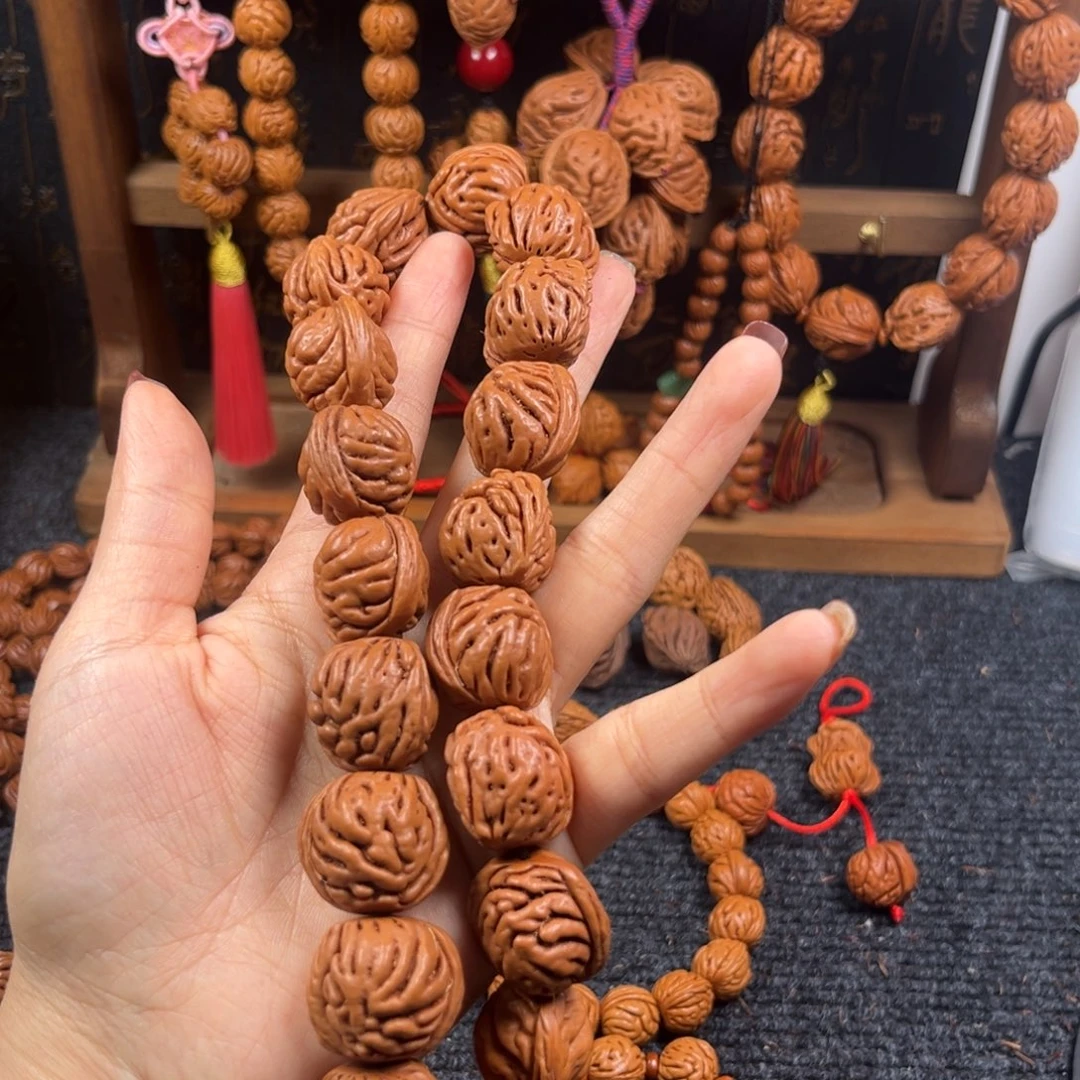 星***爱桃核吊坠桃枭手持L12