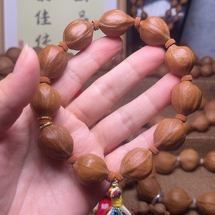 开***L橄榄核手串鸡血红18.22