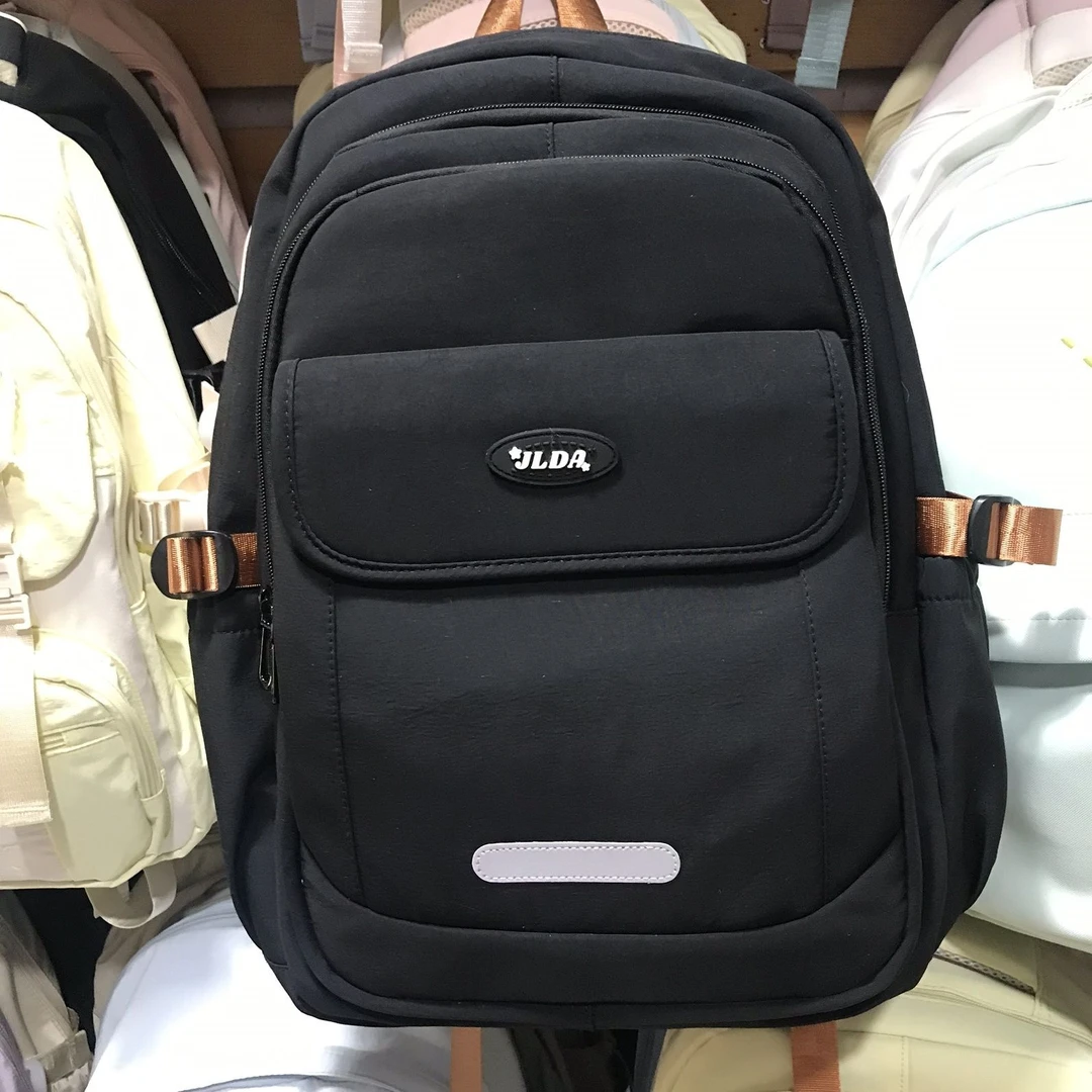 江利达休闲多功能减负护脊轻便耐磨时尚高品质书包简约户外