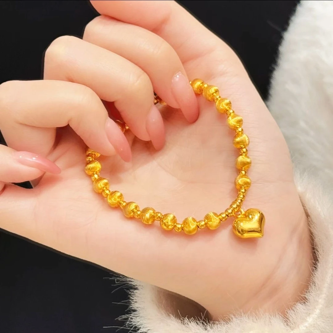 铜合金手链 新款饰品猫眼拉丝车花爱心圆珠金色弹力绳手链女串珠