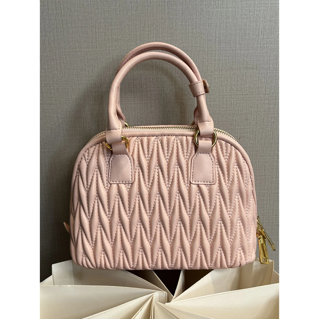 TOLEX2025新款手工时尚百搭女包贝褶皱粉色