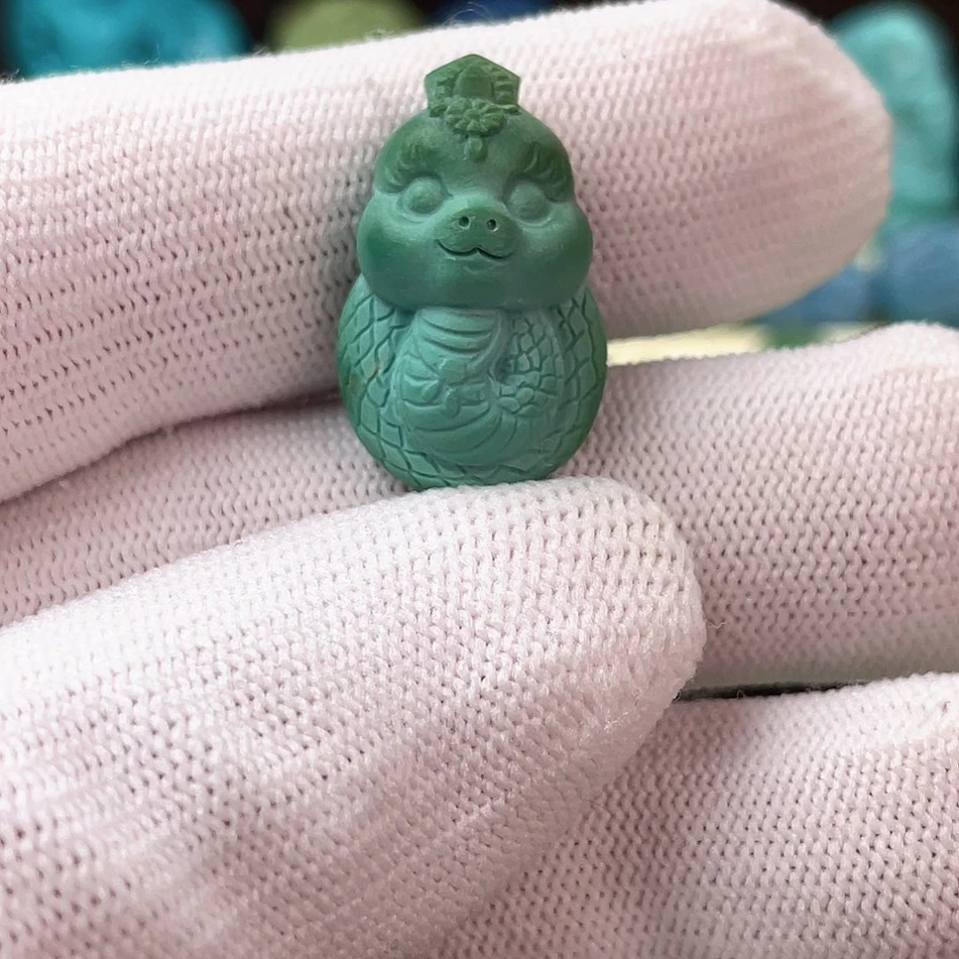 庚***雷绿松石未镶嵌平安扣