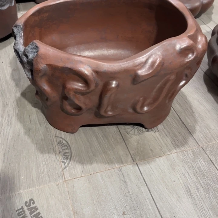 半***头紫砂花盆宜兴紫砂工艺厂。