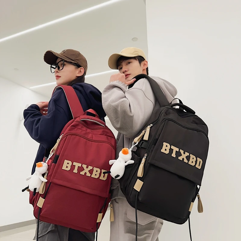 C01-C50编号新款双肩包旅行包学生包孤品款式男士休闲双肩包