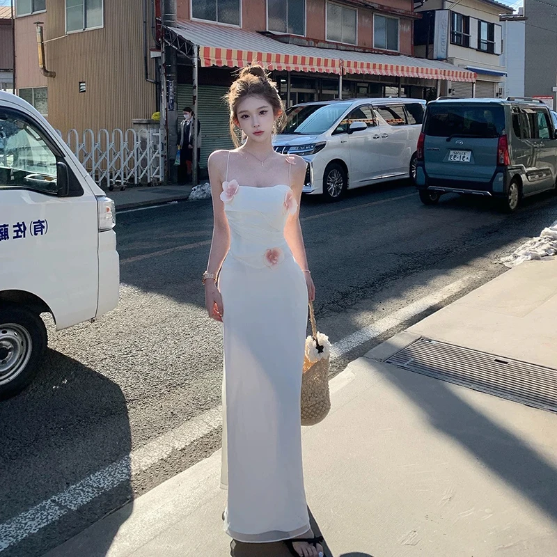 现货【月桂神语】 收腰吊带连衣裙夏季中长款设计感性感花朵长裙子