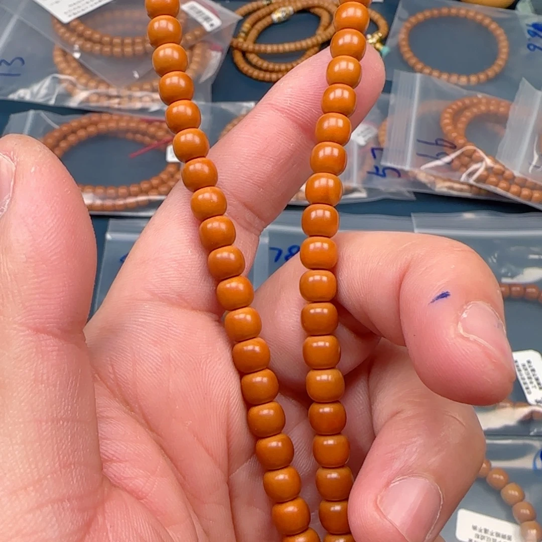 朵***娜橄榄核手串老挝SS级核尖极限弧尺寸6.7×54颗全无白