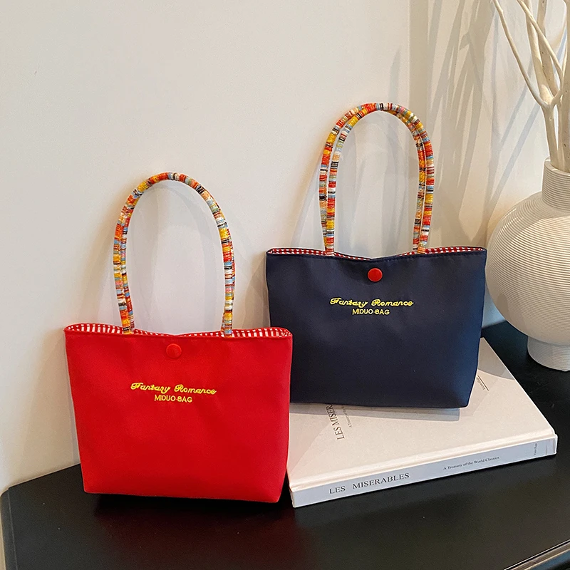 可爱精致手提包手机包百搭吸睛通勤拎包撞色便携补妆外出随身便携