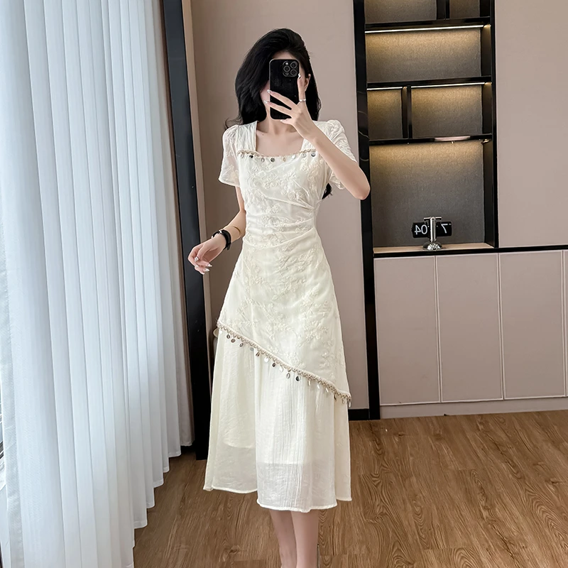 法式轻熟风流苏短袖连衣裙女2025夏季新款设计感拼接长裙收腰显瘦