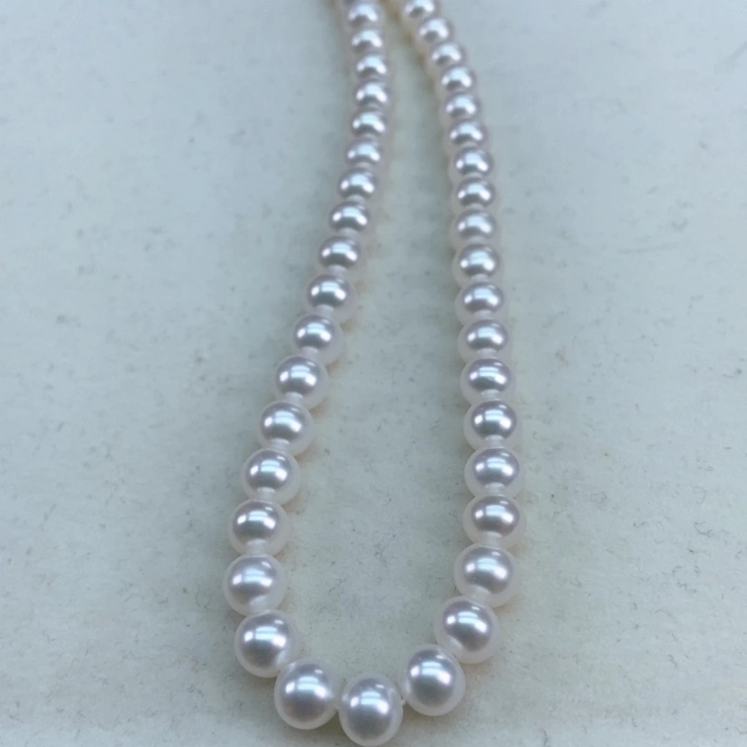 银S925镶嵌淡水珍珠16/7极光冷白正圆毕业