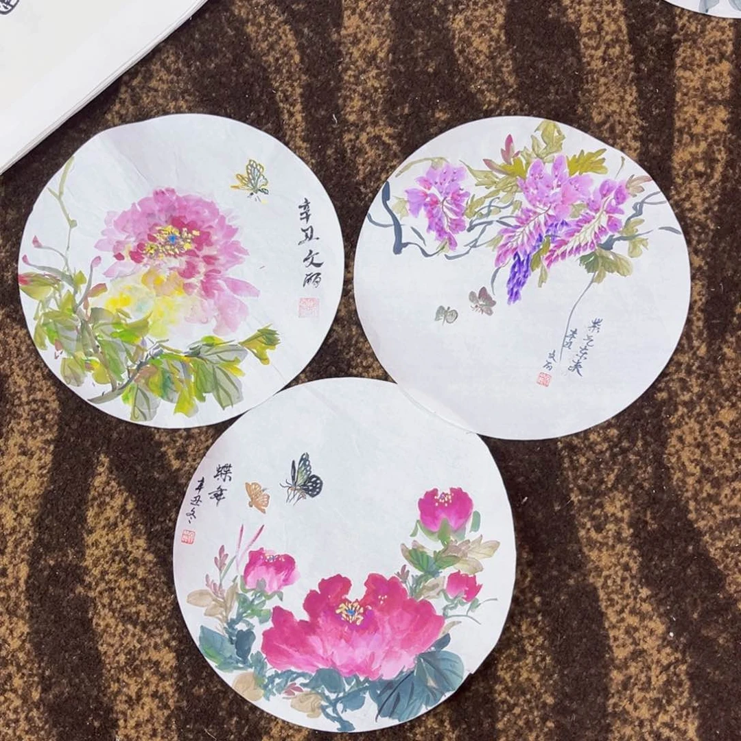 国画文丽老师绘画三张圆片