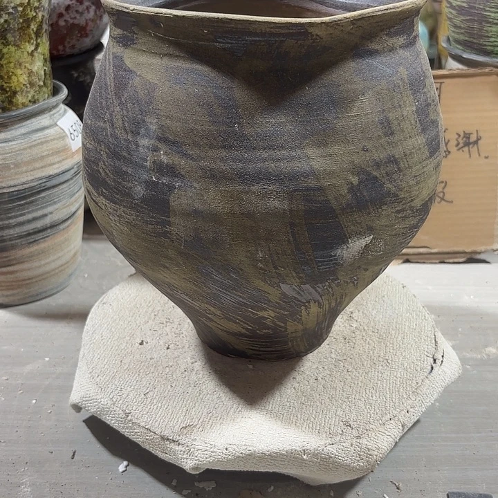 陶摆件高24，口16到17，492，有孔