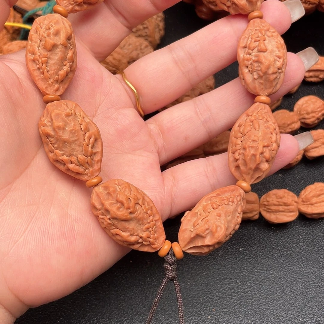 洋***丁吊坠文玩核桃麒麟