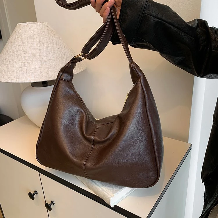 女包包大容量2025春季新款百搭时尚通勤精致托特包轻奢斜跨包单肩