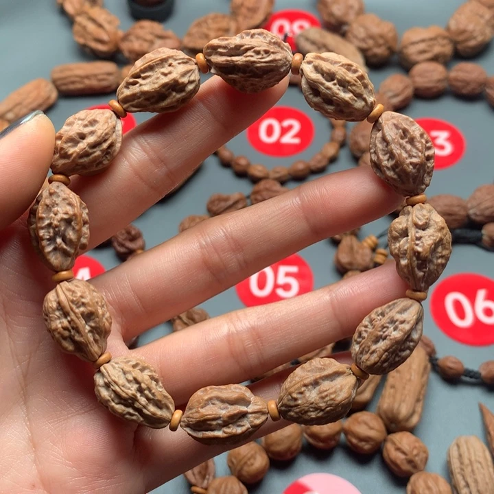 文玩核桃手串600钱袋子异型