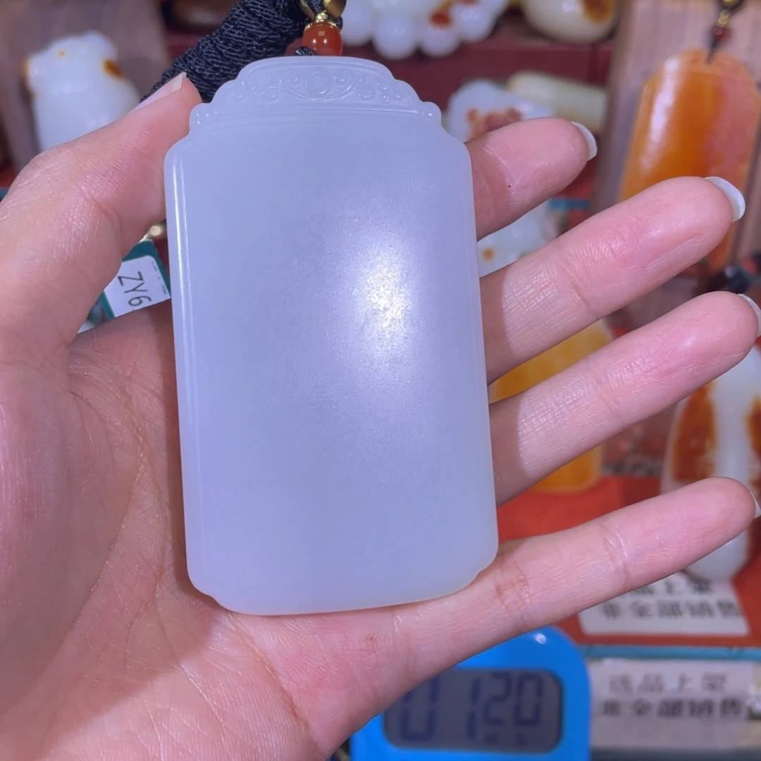 旭***。和田玉未镶嵌挂件