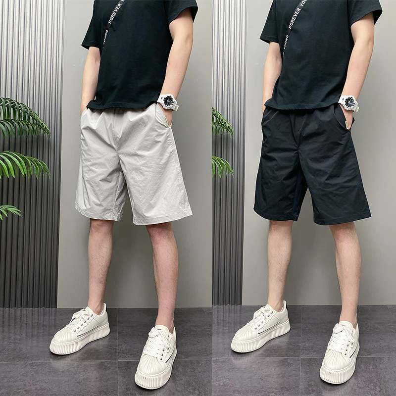 2025年夏季薄款潮流韩版痞帅修身速干青年男士休闲沙滩四分裤子男