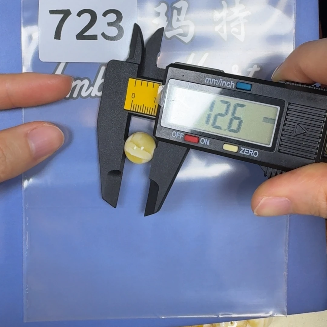 稳***。琥珀未镶嵌珠宝奇石打孔不退换