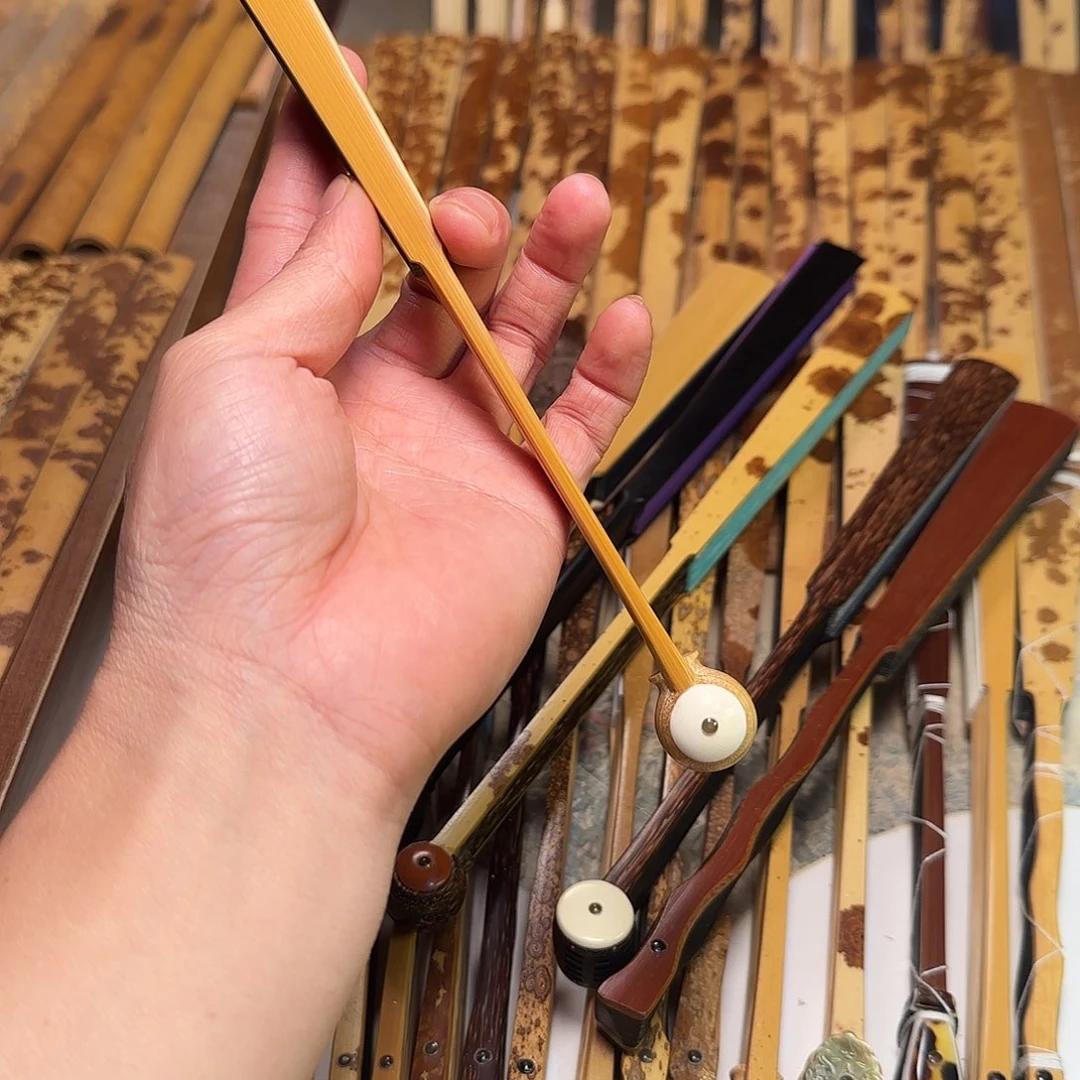 扇子得**间8寸1.8排口16方琴圆白撒金