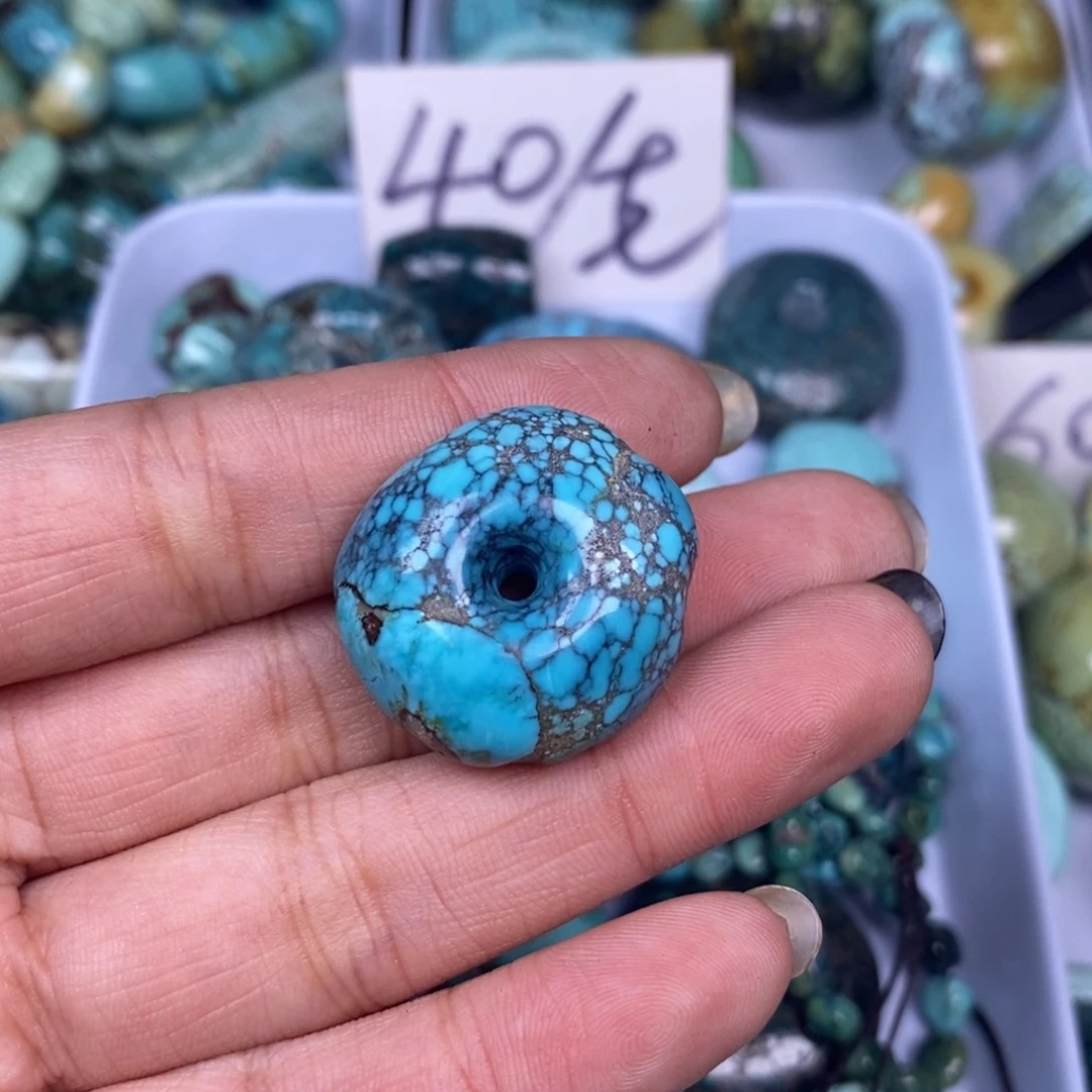 莫***程绿松石未镶嵌挂件