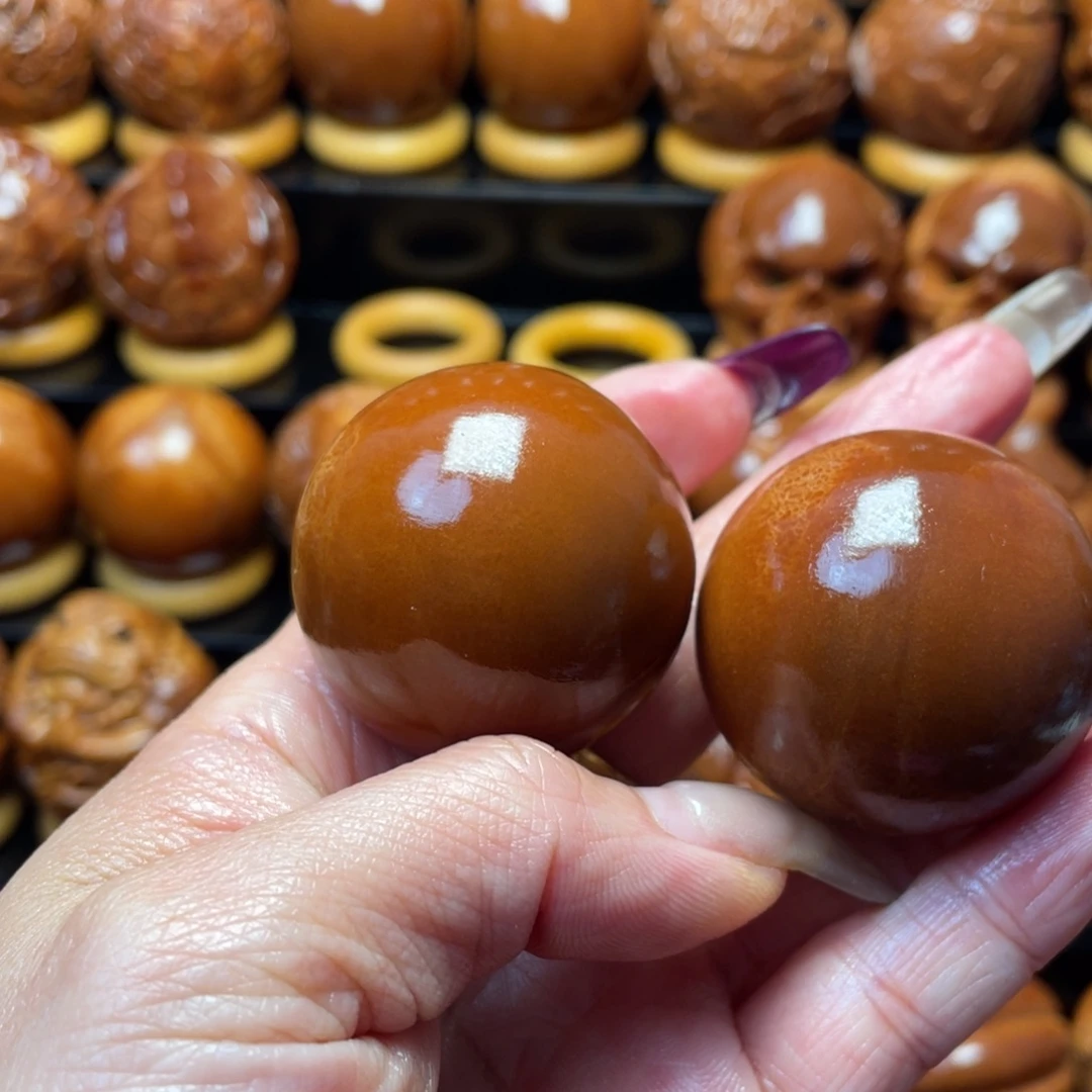 张***三把件橄榄核橄榄球