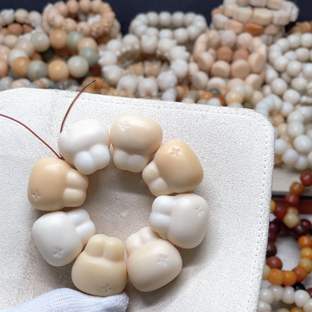 菩提根/象牙果吊坠K****k微瑕兔头手捻913