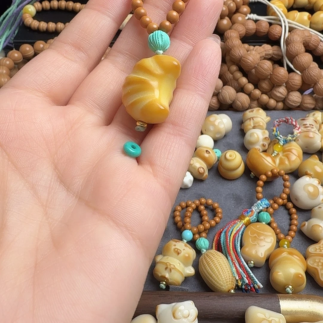 菩提根/象牙果吊坠牛角包跑环
