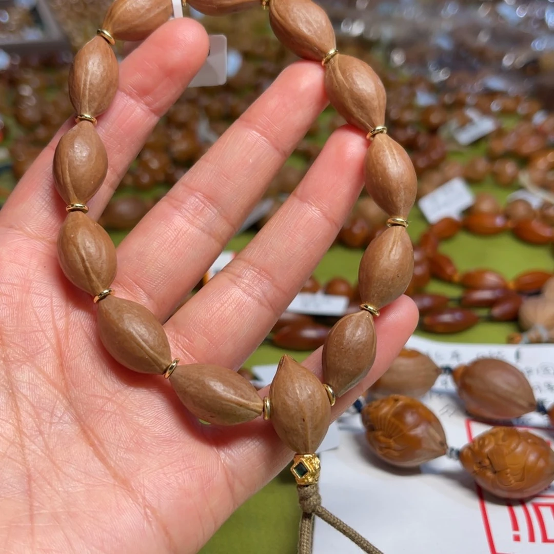 橄榄核吊坠小素核手串