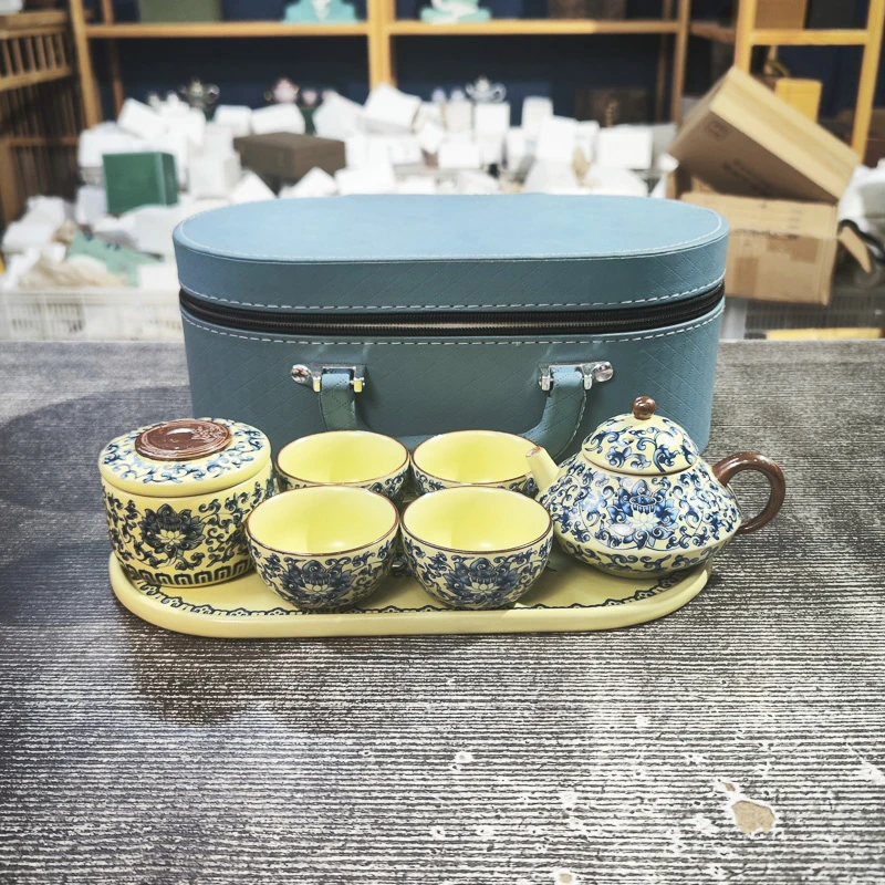 汝窑青花缠枝莲飞碟手执壶加4杯加茶叶罐加茶盘加皮包