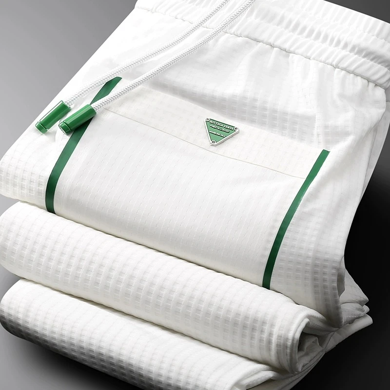 夏季薄款休闲运动裤男轻奢级华夫格弹力修身束脚三角标男士卫裤子