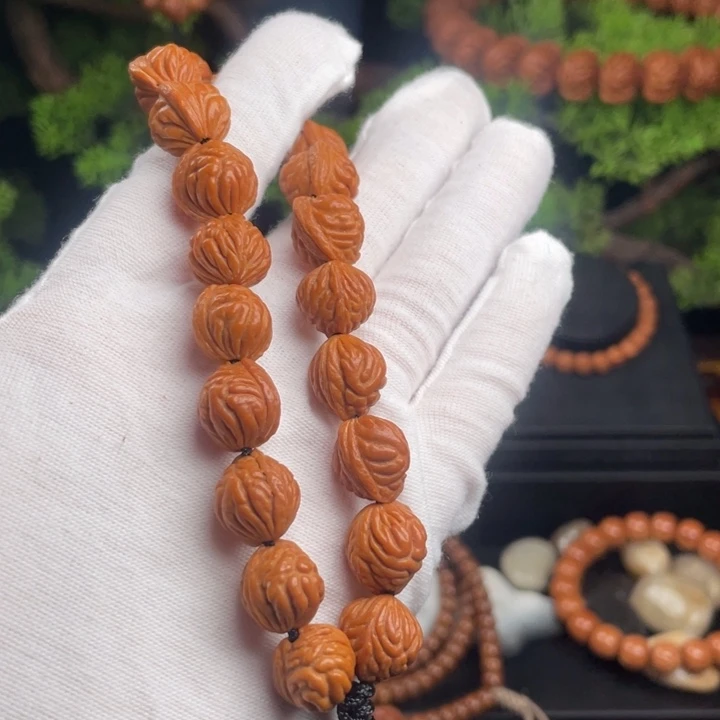 w***e桃核吊坠精品小金豆