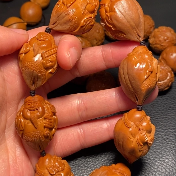 橄榄核手串/手链斑***。财神包衣
