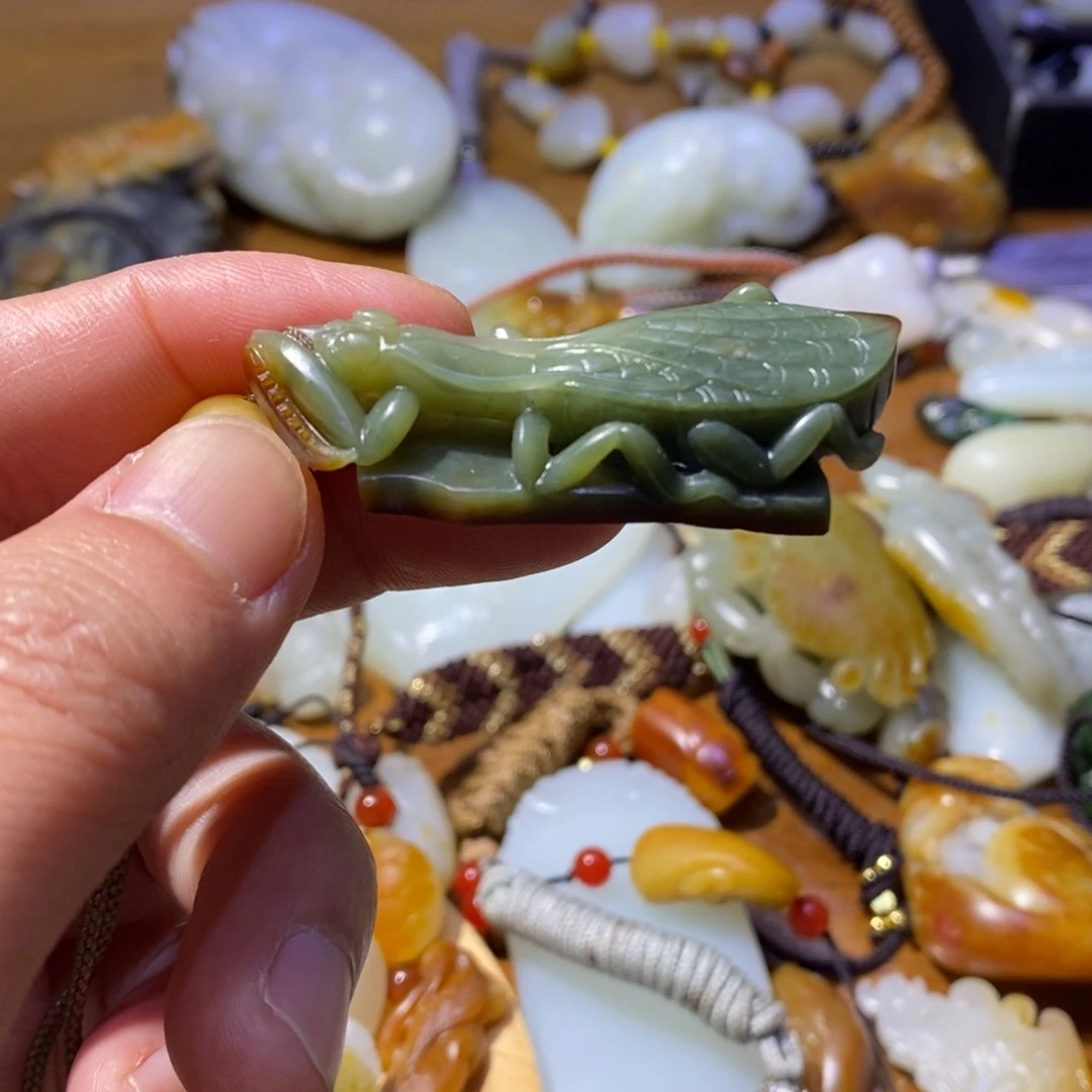 和田玉颈饰未镶嵌孤****手